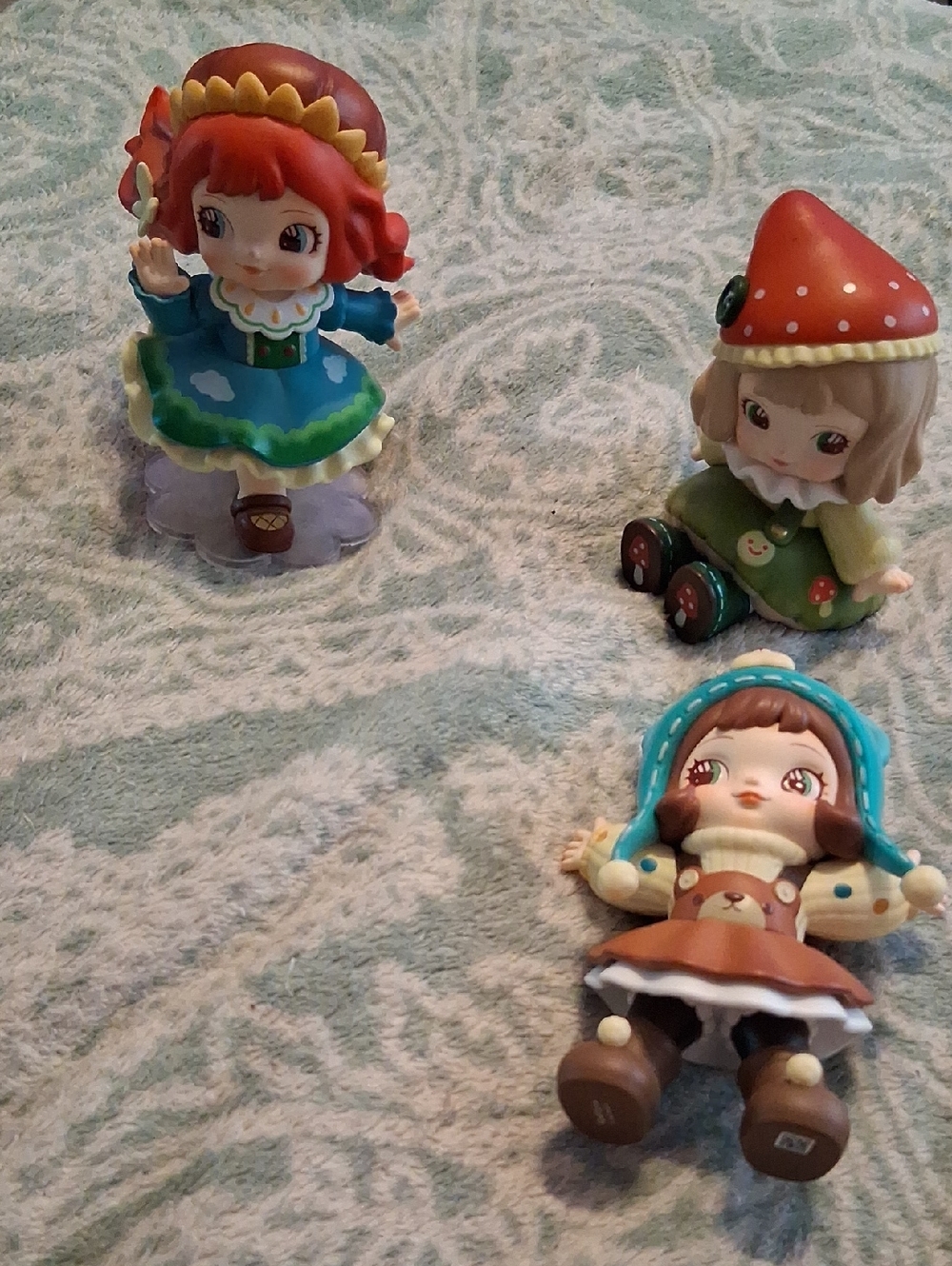 Charline Doll Figurine Set - Blue, Green, Red Accents